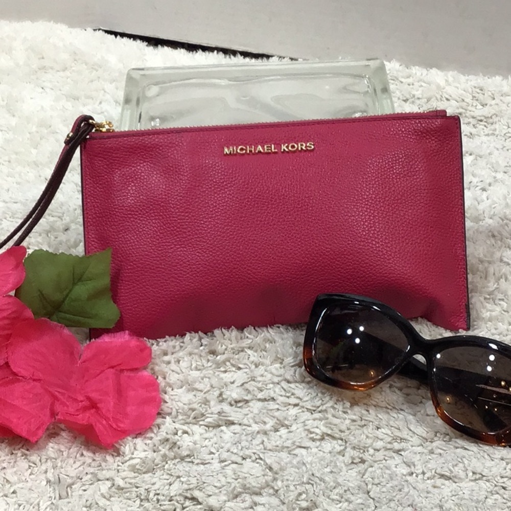 Michael Kors pink leather zip top wristlet